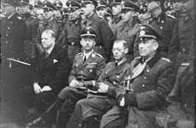 Vidkun quisling (vlevo) a reichskommissar josef terboven (uprostřed) kontrolují čestné partnerství důstojníků statspolitiet. Quisling Wikipedia