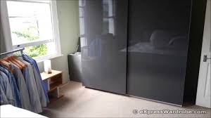 An ikea pax wardrobe system without doors ikea get some advil (or bourbon) and fire up the planner. Ikea Pax Wardrobe With Hasvik Gloss Grey Sliding Door Design Youtube