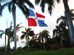 The blue on the flag stands for liberty, the white for salvation, and the red for the blood of heroes. Dominican Republic Dominican Flag Dominican Republic Flag Beautiful Islands