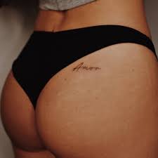 Not as funny as it was when you got it — even though that wasn't really funny, either.. Amor Lettering Tattoo On The Butt Cheek