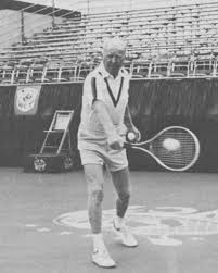 A much older Don Budge hitting his famous backhand.
