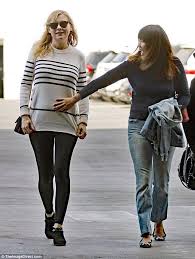 The actress revealed her pregnancy in w magazine's directors issue and showed her growing baby bump — in couture, no less — on the cover. Pregnant Kristen Dunst Looks Chic In Striped Sweater With Leggings Kirsten Dunst Pregnant Kirsten Dunst Jumper Outfit