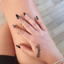 50 Small Hand Tattoo Ideas From Cute To Edgy Cafemom Small Hand Tattoos Hand Tattoos For Women Hand Tattoos For Girls