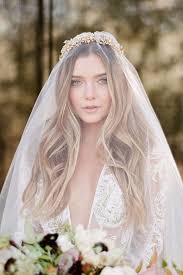 Low bun updo wedding hairstyle with pearls veil Down Wedding Hairstyles For Long Hair With Veil Addicfashion