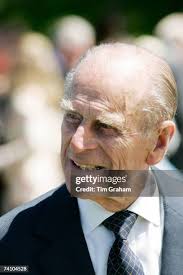 Queen Elizabeth II visits the National WWII Memorial with Mary Bomar,...  News Photo