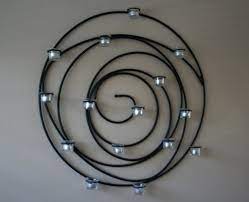 Ember hearth electric media fireplace fireplace ideas from. Pottery Barn Spiral Candle Holder In Living Room Wrought Iron Candle Wall Sconces Iron Candle Sconce Wrought Iron Candle Sconces