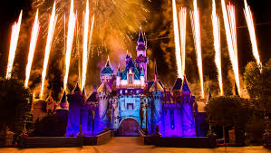 Photo about disney`s magic kingdom cinderella castle at night, lit in purple colors with fireworks. Disneyland Fireworks Projections Add New Dimension
