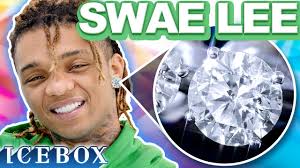 Swae Lee Puts 10 Carat Diamonds in His Ears! 💎