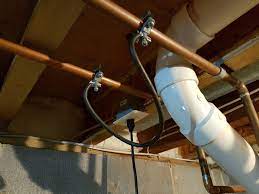 Vent stacks allow sewer/septic gases to escape and provide proper drain flow. What Is This Wire Clamped Between My Cold And Hot Water Pipes Home Improvement Stack Exchange
