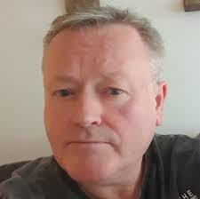 It's the late 1970s in Yarrows with many of the McKain family who all  worked in the yard at dame time. I am bottom left and my father Wullie  McKai is third