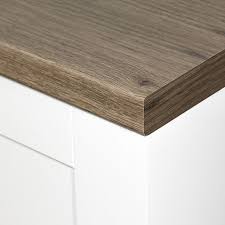 Oak floor, matt grey worktop, white gloss units. Tobacco Oak Kitchen Worktops Online