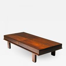 Shop for round, rectangular, square, or oval tables to fit your available space and select from pieces with a light or dark walnut color for a look you'll love. Michelluci Walnut Coffee Table With Storage 1970 S