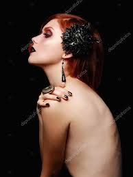Sexy goth girl with black flower Stock Photo by ©photoagents 84412242