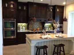 Whether you are designing a new kitchen, bathroom, or other cabinetry project, we utilize a number of different types of woods to suit your needs. Knotty Alder Cabinets Paired With An Antiqued White Maple Island Love The Mantle Style Detail Dark Wood Kitchen Cabinets Alder Cabinets Knotty Alder Cabinets