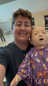 Teaching today!! It's EMS field day. I'm teaching prehospital providers  (Students, EMTs, paramedics) about caring for kids. We use high fidelity  simulation babies to help them get more comfortable by running through