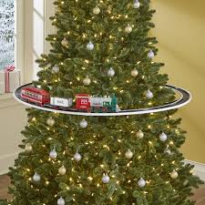 Train around the christmas tree. The Elevated Christmas Tree Train Hammacher Schlemmer