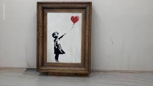 In a video shared to the artist's instagram, the anonymous graffiti genius is seen entering a carriage in a hazmat suit, face mask and goggles. Banksy Tags Face Mask Street Art As Italy Returns Stolen Work To France