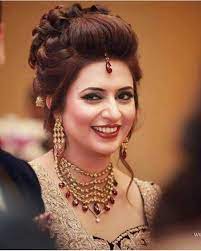 A good hairstyle can make the bride look more confident with her gorgeous long wedding dress. Indian Wedding Trend Beautiful Bride Divyanka Tripathi Splendid Indian Wedding Hairstyles Bride Hairstyles Hair Styles