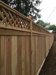 The good thing about the wooden fence design is sometimes they also fulfill both requirements of the homeowners that is the form and the functionality. Red Cedar Privacy Fence With A Diagonal Lattice Topper Privacy Fence Designs Fence Design Wood Fence Design