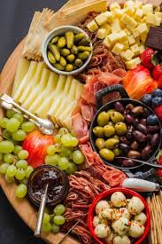 A delicatessen specializing in such foods. How To Make A Charcuterie Board Video Natashaskitchen Com