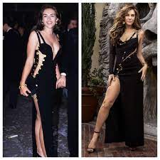 Elizabeth hurley's plunging black dress today came with a tgif, a.k.a. Elizabeth Hurley S Versace Safety Pin Dress Gets A Modern Update Wwd