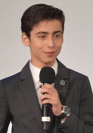 He has a height of 5 feet 4 inches and his weight is 50 kg. Aidan Gallagher Wikipedia