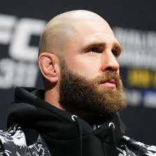 Ashly McGarity was diagnosed with cervical cancer in September. As she was  losing her hair to chemo, she cut it to look like her favorite UFC fighter.  In solidarity with her fight