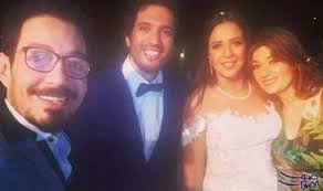أحمد زاهر ينشر صورته مع زوجته برفقة حرص الفنان أحمد زاهر على تهنئة العروسين إيمي سمير غانم وحسن الرداد من خلال نشره صورة عبر صفحته