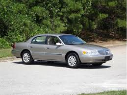 Image result for Light Parchment Gold 1999 Town Car