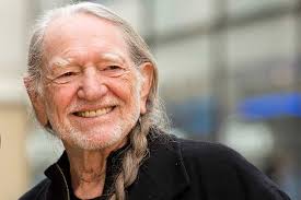 Willie Nelson keeps living the life he loves at 92. 'I'm not through with  it yet'