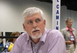 Fr. Gunter Enters Laughing