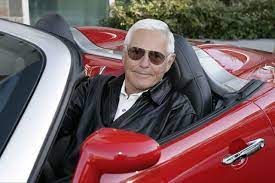 mr pontiac bob lutz in a aggressive red solstice pontiac solstice solstice car pontiac