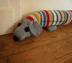 Un Bas De Porte Boudin En Forme De Chien Qui Mesure 87 Cm Environ On Peut Bien Sur Le Faire D Boudin De Porte Couture Coussin Bas De Porte Tricot Facile Tuto