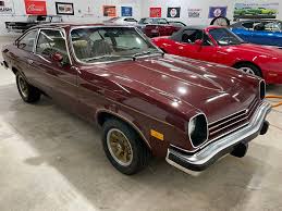 Image result for Dark Yellow 1976 Vega