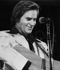 Hard to imagine Possum fans digging Gene Pitney, and hard to imagine the  other way around as well. Is it just me, or does George look like he's not  enjoying this at