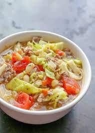 Bring the soup to a simmer, and add the drained cannellini, bay leaves, and crushed red pepper. Italian White Bean Cabbage And Sausage Soup Barefeet In The Kitchen