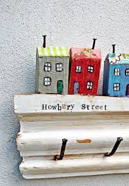 I found that the easiest way to get the spacing right is by marking it all off on a piece of painters tape. How To Make A Fun Wall Key Holder From Junk Pillar Box Blue