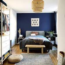 Room Redo Bohemian Inspired Masculine Bedroom With Navy Accent Wall Eclectic Bedroom Masculine Bedroom Bedroom Wall