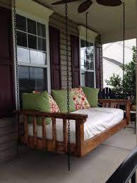 Turned An Old Twin Mattress Into The Best Couch Bed Swing Our Favorite Spot In All Seasons A Must For A Porch Porch Swing Bed Porch Swing Porch Bed