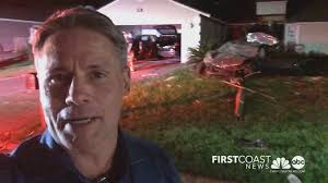 Camaro plows through home