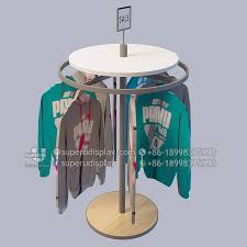 A clothing rack for you and a clothing rack for the little one! Custom Rotating Round Hanging Garment Rack For Retail Shop Store Display Design Manufacturer Supplier Store Display Design Clothing Rack Display Garment Racks