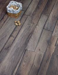 Egger S Megafloor Heritage Oak Is A Stunning Dark Oak Rustic Floor Bursting With Character It Is Diy Rustic Laminate Flooring Attic Renovation Attic Lighting