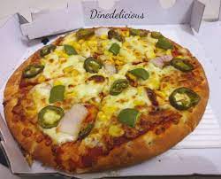 pizza from ovenstory the crust was fluffy soft fresh and really good i was always a fan of dominos cheese burst or thin crust pizza but this has changed my