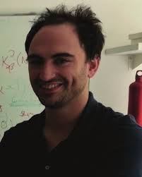 Colloidal heat engines: a review