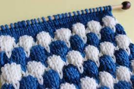 You have to cast on a multiple of row 5: Bubble Stitch Knitting Pattern Studio Knit