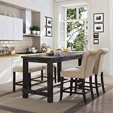 The difference between a standard dining room set, and a counter height or bar height dining set is just a matter of a few inches. Amazon Com Rustic Counter Height Dining Table Antique Black Farmhouse Transitional Rectangle Veneer Wood Finish Distressed Tables