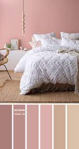And then lighten things up with colorful linens and keep things streamlined with bright a white ceiling and modern bedside sconce. Dusty Rose And Taupe Bedroom Color Scheme