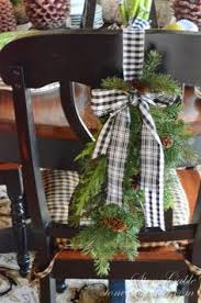 Decorating Your Dining Chairs For The Holidays Christmas Decorations Christmas Deco Christmas Chair