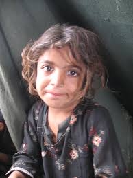 At the Razzaqabad IDPs camp in Karachi, Pakistan.