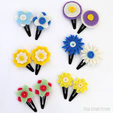 Making hair clips out of buttons is fun, easy and requires very few supplies. Felt Flower Hair Clips The Craft Train